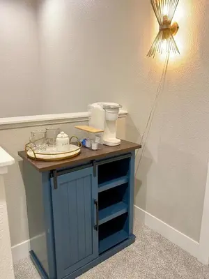 a blue cabinet with a light on top of it at Lovely Townhome at the TPC Golf Course in Berthoud