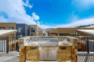 a grill on the deck of a building at Skywalk Flats Escape in Silverthorne