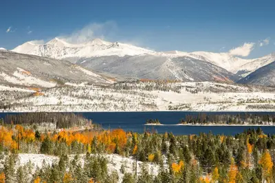 a lake in the middle of a snowy mountain at Skywalk Flats Escape in Silverthorne
