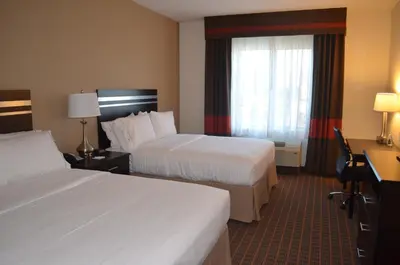 a hotel room with two beds and a window at Holiday Inn Express & Suites Golden by IHG in Golden