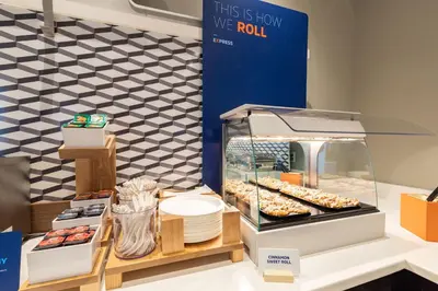 a display case with donuts and other pastries at Holiday Inn Express & Suites Golden by IHG in Golden