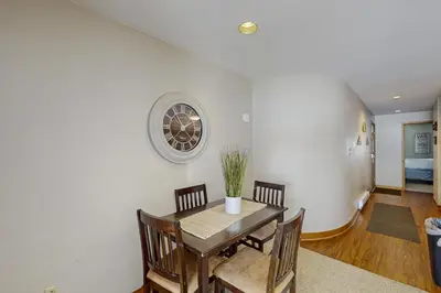 a dining room with a table and chairs and a window at Lakeview Peaks in Dillon