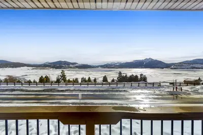 a view from a window of a snow covered field at Lakeview Peaks in Dillon