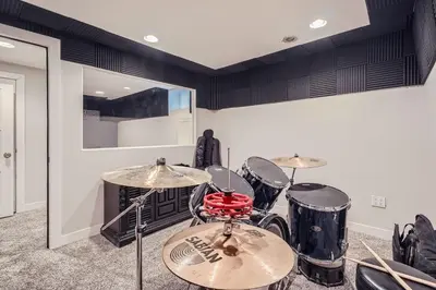 a room with a drum set in a room at Spacious Denver home in Denver