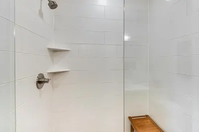 a bathroom with a shower with a glass door at 3 Mi to Winter Park Resort Mtn-View Haven! in Winter Park