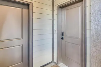 a door in a room with a wall at 3 Mi to Winter Park Resort Mtn-View Haven! in Winter Park