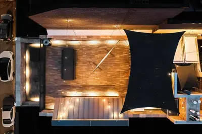 a large brick wall with a clock on it at Suite No 1 in Denver