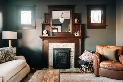 a living room with a fireplace and a couch at Exquisite Craftsman - RiNo&Cole - Backyard Garden in Denver