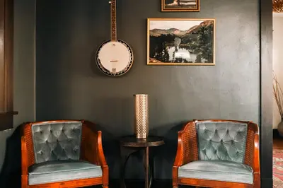 two chairs and a table in a room at Exquisite Craftsman - RiNo&Cole - Backyard Garden in Denver