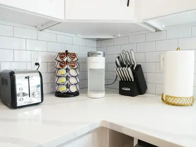a kitchen counter with a toaster and a toaster at Entire House Kid Ready Yard in Arvada