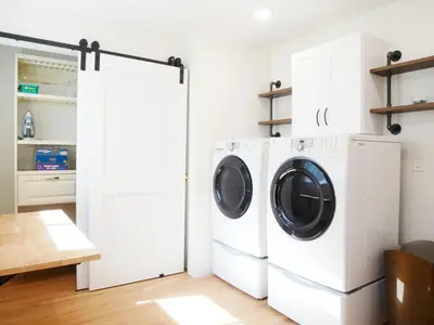 a white laundry room with a washer and dryer at Entire House Kid Ready Yard in Arvada