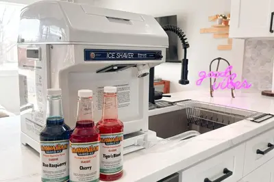 a kitchen counter with three bottles of hot sauce at Modern Family Friendly Escape Central 5 Bedroom in Denver