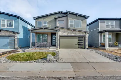 a house with a garage in front of it at Hike, Bike and More Superior Home 3 Mi to Parks! in Superior