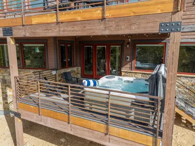 a wooden building with a hot tub in it at Ridge View Retreat - Panoramic Views and Hot Tub in Nederland