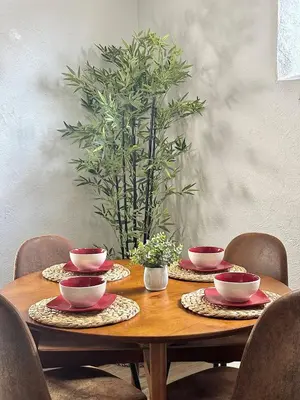 a wooden table with four bowls and plates on it at 1920s Inspired Stay-coffee Bar- Cozy-local in Denver