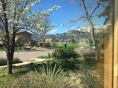 a view of a park with mountains in the background at 5 bedroom, 7 beds, 3 bath - Sleeps 12, Great for Families in Boulder