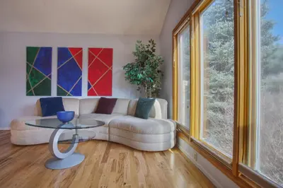 a living room with a couch and a table at 5 bedroom, 7 beds, 3 bath - Sleeps 12, Great for Families in Boulder
