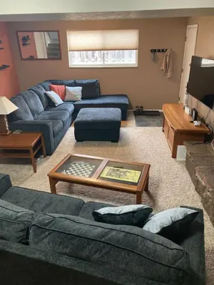 a living room with couches and a coffee table at 5 bedroom, 7 beds, 3 bath - Sleeps 12, Great for Families in Boulder