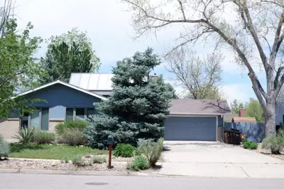 a house with a parking meter in front of it at 5 bedroom, 7 beds, 3 bath - Sleeps 12, Great for Families in Boulder