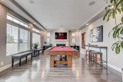 a billiard room with a pool table in it at 5400sqft 6BR 5BA Theater, Office, Game Room in DEN