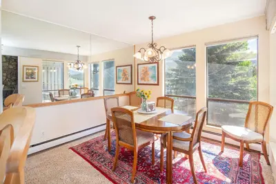 a dining room with a table and chairs at Pool and Hot Tubs, On Lake Dillon, Beautiful Views in Dillon
