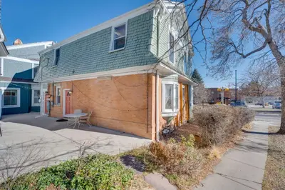 a small house with a green roof at 1 Mi to CU Boulder Condo Near Pearl Street! in Boulder