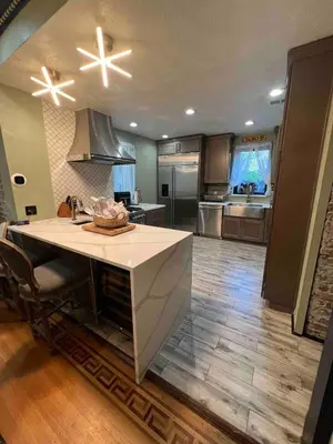 a kitchen with a large island in the middle at 4 BR Luxurious-Gem Mansion in Heart of Denver in Denver