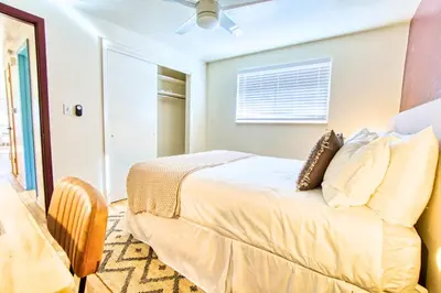 a bedroom with a bed in a room at Joy House in Golden