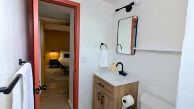 a bathroom with a sink and a mirror at Joy House in Golden
