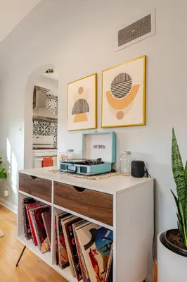 a white desk with a printer on top of it at Boho Cozy House with bikes, 2 blocks to Sloans Lake! in Denver