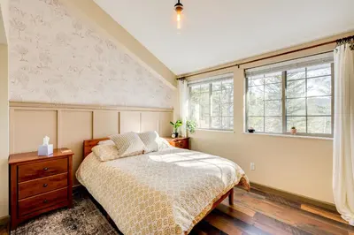 a bedroom with a bed and a window at 3 Mi to Casinos Cabin with Stables in Black Hawk! in Black Hawk