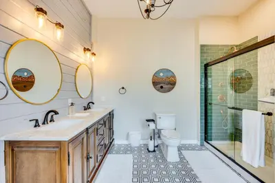 a bathroom with a sink and a toilet and a shower at 3 Mi to Casinos Cabin with Stables in Black Hawk! in Black Hawk