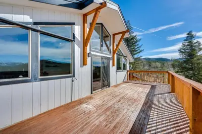 a wooden deck with windows on a house at 3 Mi to Casinos Cabin with Stables in Black Hawk! in Black Hawk