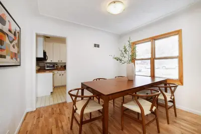 a kitchen and dining room with a wooden table and chairs at 5 minute drive to Pearl Street - Best Neighborhood in Boulder in Boulder