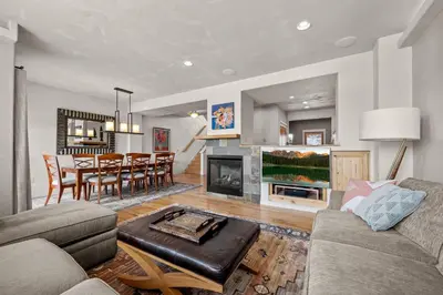 a living room with a couch and a table at 107 Red Quill in Winter Park