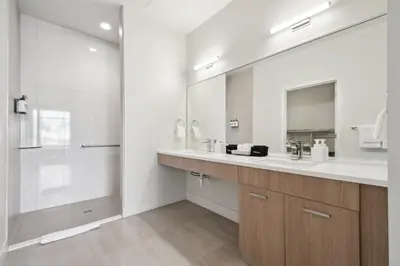 a bathroom with a sink and a mirror at Cloud Nine Retreat at Espadin in Denver