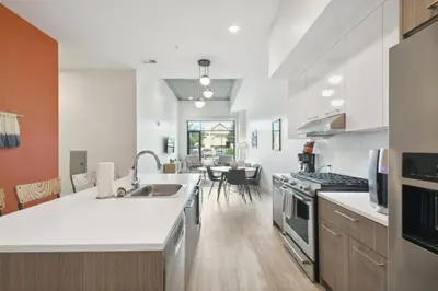 a kitchen with a sink and a counter top at Cloud Nine Retreat at Espadin in Denver