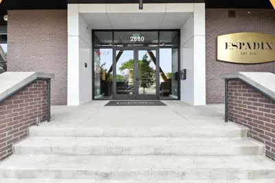 an entrance to a building with a revolving door at Relaxed Elegance at Espadin in Denver