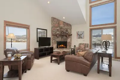 a living room with a couch and a fireplace at Luxe MTN Escape 15 min to Winter Park Base in Tabernash