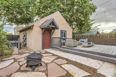 a backyard with a fire pit and a house at RINO Five Points Downtown in Denver