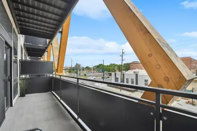 a balcony with a view of a street at 2880 Japandi Minimalism at Espadin in Denver