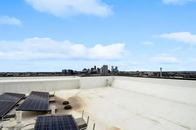 a rooftop with solar panels on the roof at 2880 Japandi Minimalism at Espadin in Denver