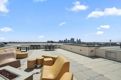 a view from the roof of a building with chairs and tables at 2880 Natural Influence Sanctuary at Espadin in Denver