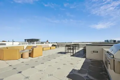 a patio with a view of the beach at 2880 Sophistication Simplified at Espadin in Denver