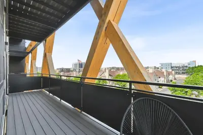 a balcony with a view of the city at 2880 Rose All Day at Espadin in Denver