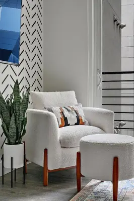 a living room with a white couch and a plant at 2880 Sky Edge Suite at Espadin in Denver