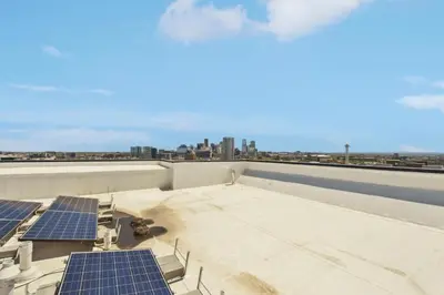 a rooftop with solar panels on the roof at 2880 Sky Edge Suite at Espadin in Denver