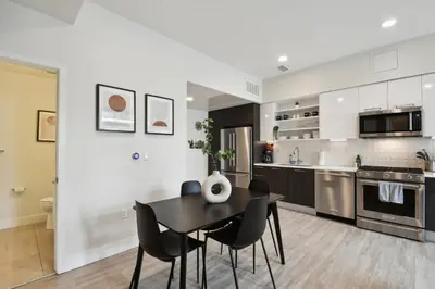 a kitchen and dining room with a table and chairs at 2880 Enchanting Moroccan Oasis in Denver