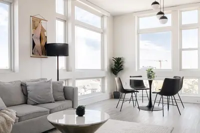 a living room with a couch and a table at 2880 Denver Skyline Escape at Espadin in Denver