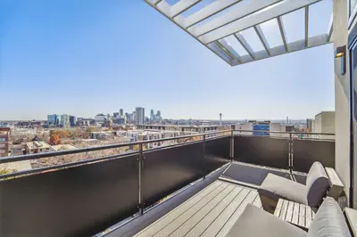 a balcony with a view of the city at 2880 The Penthouse at Espadin in Denver